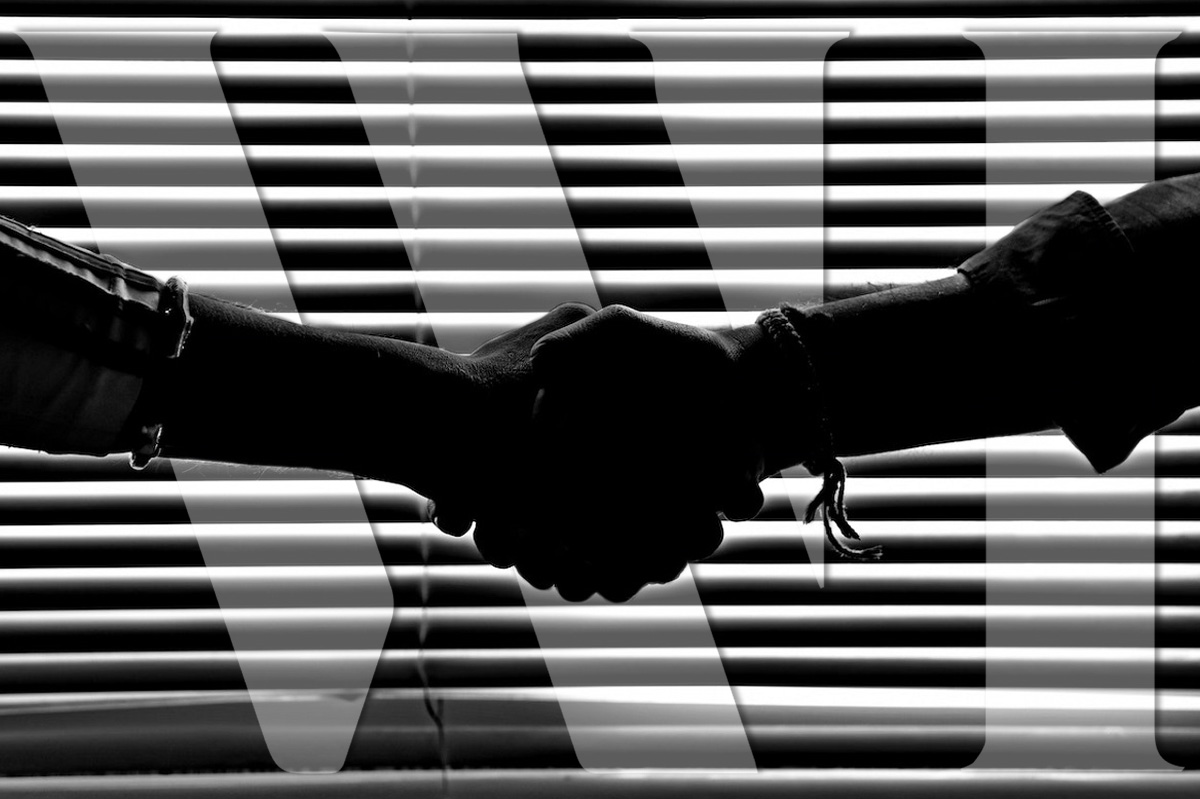 Photo of who hands shaking.