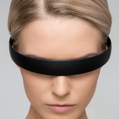 A woman wearing virtual reality glasses.